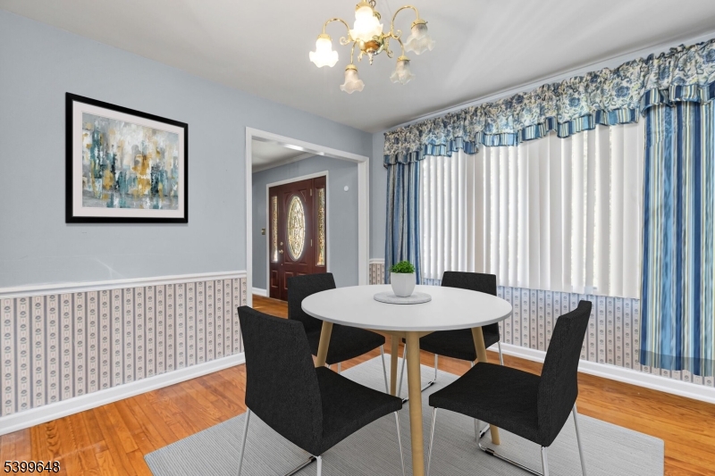 512 Township Line Road Hillsborough, NJ 08844 - Photo 4 of 40 a view of a dining room with furniture window and wooden floor