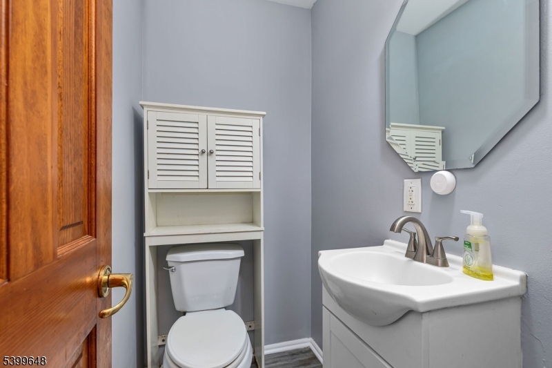 512 Township Line Road Hillsborough, NJ 08844 - Photo 6 of 40 a bathroom with a toilet sink and mirror