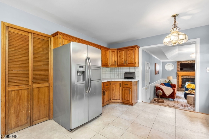 512 Township Line Road Hillsborough, NJ 08844 - Photo 9 of 40 a view of a livingroom with furniture and a kitchen