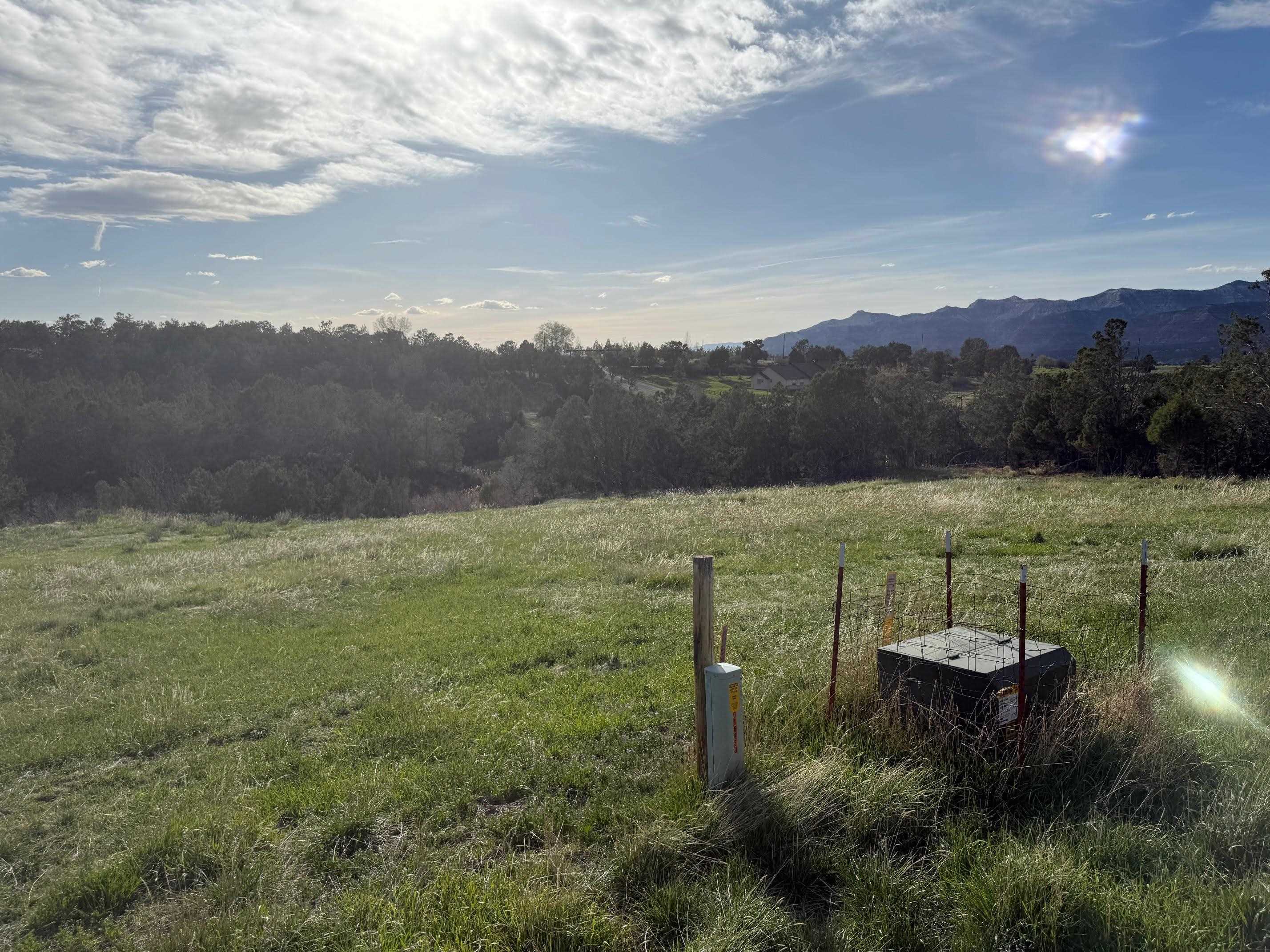 14495 Scott Loop Collbran, CO 81624 - Photo 6 of 12 a view of a lake with a mountain in the background
