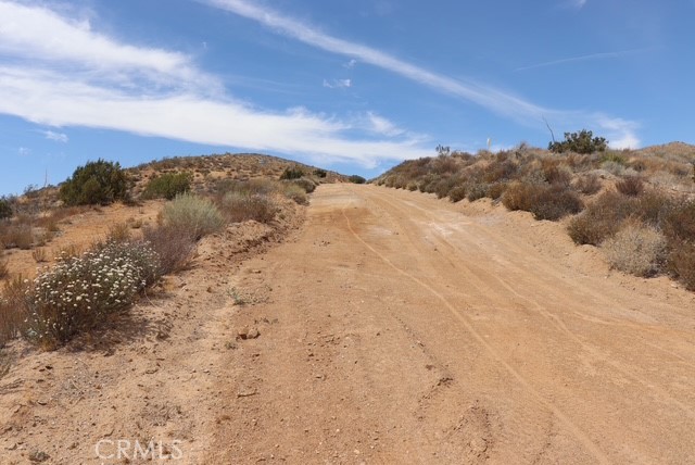 0 Kashmere Canyon Road Acton, CA 93510 - Photo 3 of 13 a view of a dry yard with mountains in the background