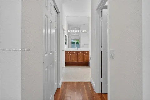 a bedroom with a bed and a desk