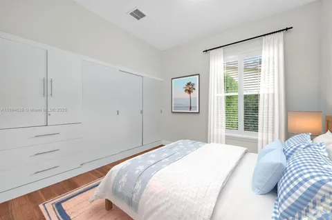 a front view of house with yard and swimming pool