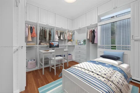 a view of a swimming pool with a yard