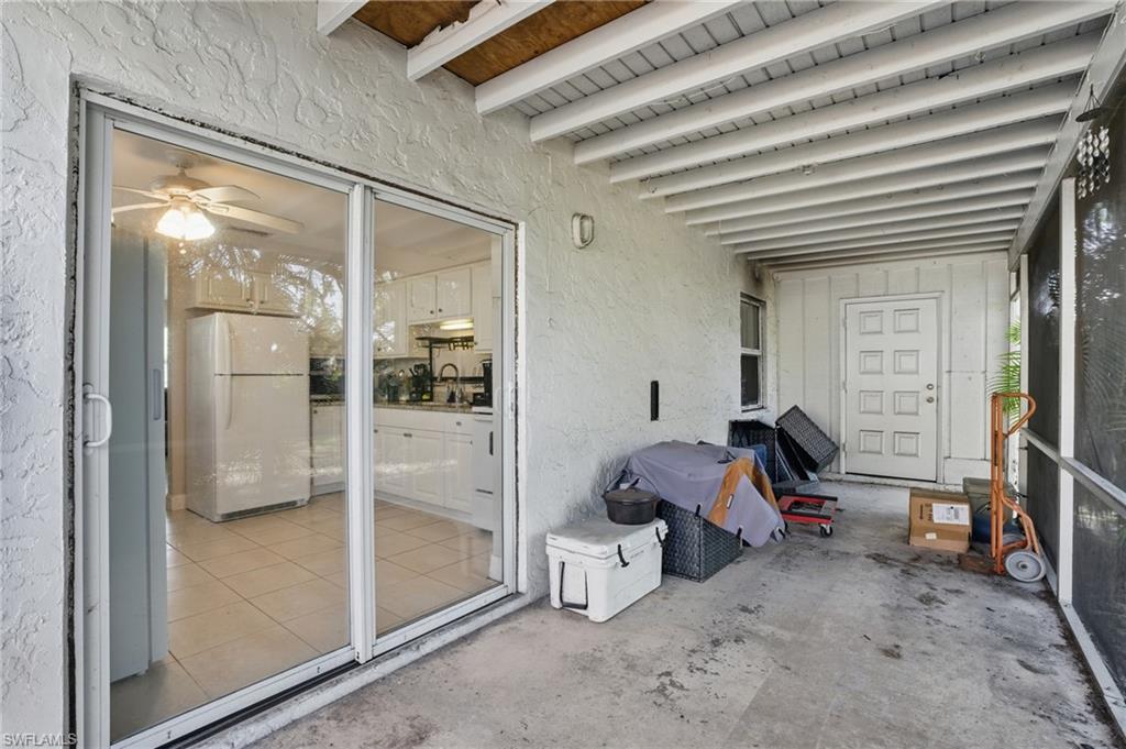 11580 Dean Street, Unit 582 Bonita Springs, FL 34135 - Photo 21 of 22 Sunroom / solarium featuring ceiling fan and a sink