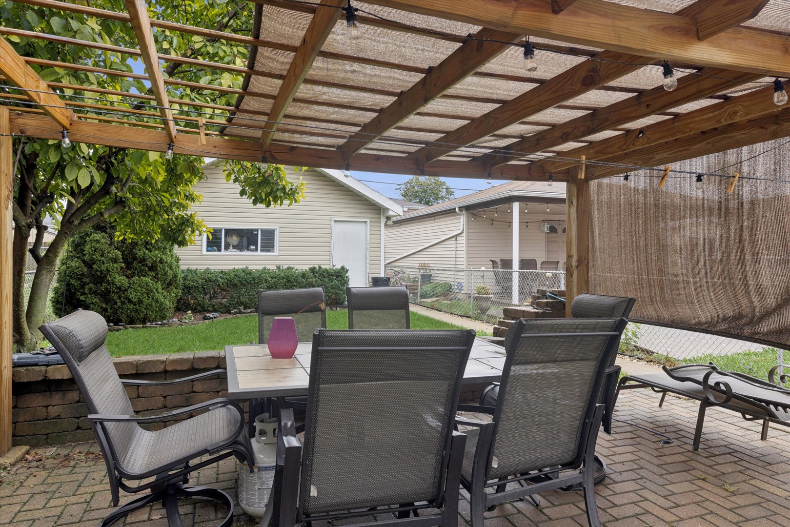 7211 West 58th Place Summit, IL 60501 - Photo 13 of 15 a view of a dining room with furniture and chandelier