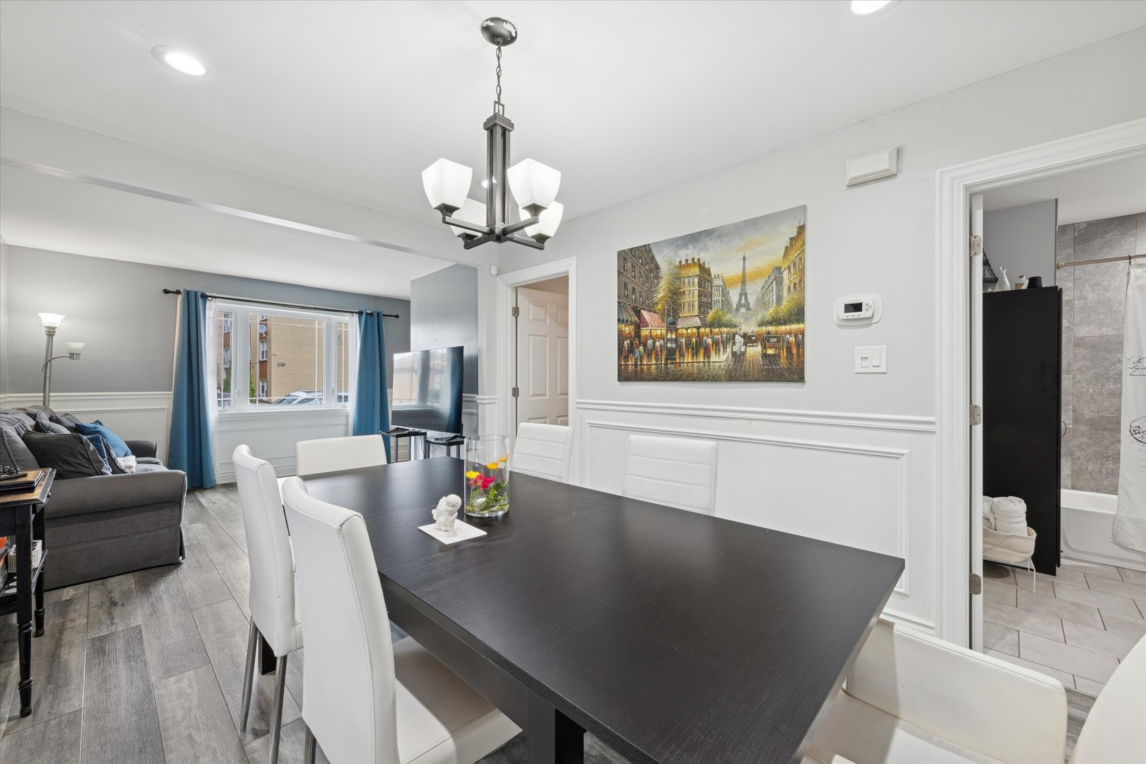 7211 West 58th Place Summit, IL 60501 - Photo 7 of 15 a view of a dining room with furniture and wooden floor