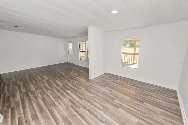 wooden floor in an empty room with wooden floor