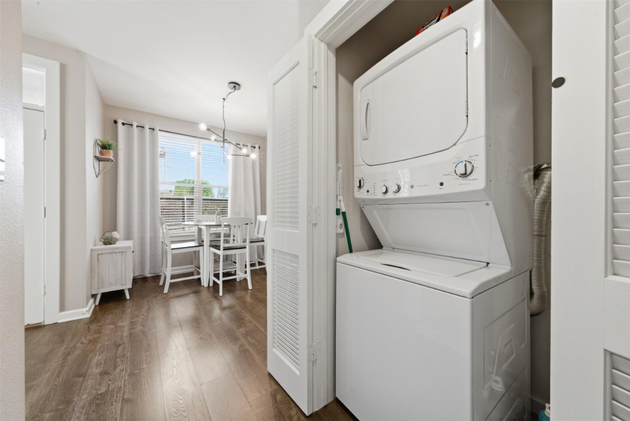 1201 Grove Boulevard, Unit 1304 Austin, TX 78741 - Photo 11 of 19 a room that has a washer and dryer in it