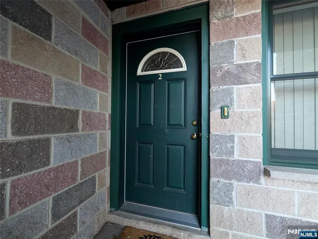 a front view of a house with a door
