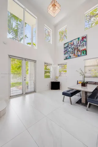 a view of workspace with furniture and window