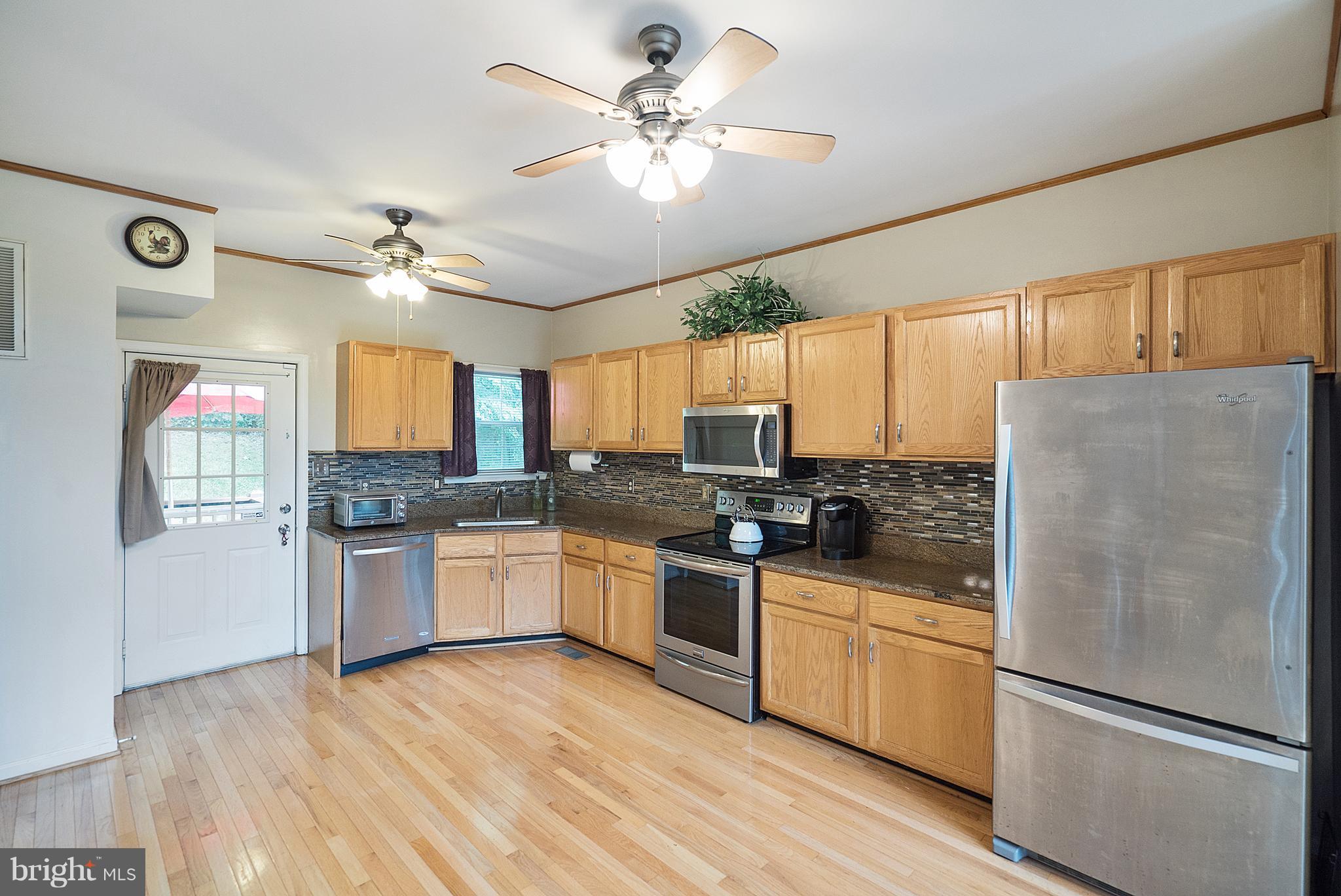 718 Freezeland Road Linden, VA 22642 - Photo 9 of 30 Kitchen with Granite & Stainless Steel