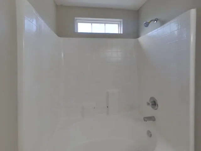 a bathroom with a bathtub