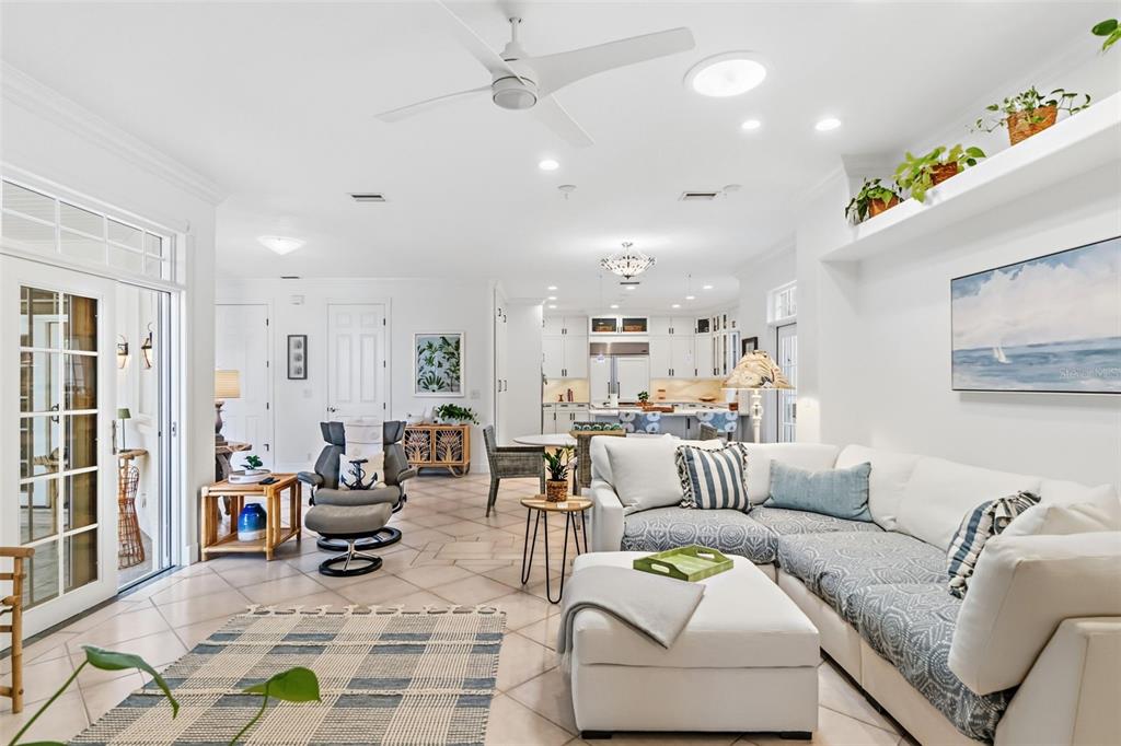 5382 Sandhamn Place Longboat Key, FL 34228 - Photo 20 of 55 a living room with furniture and a rug