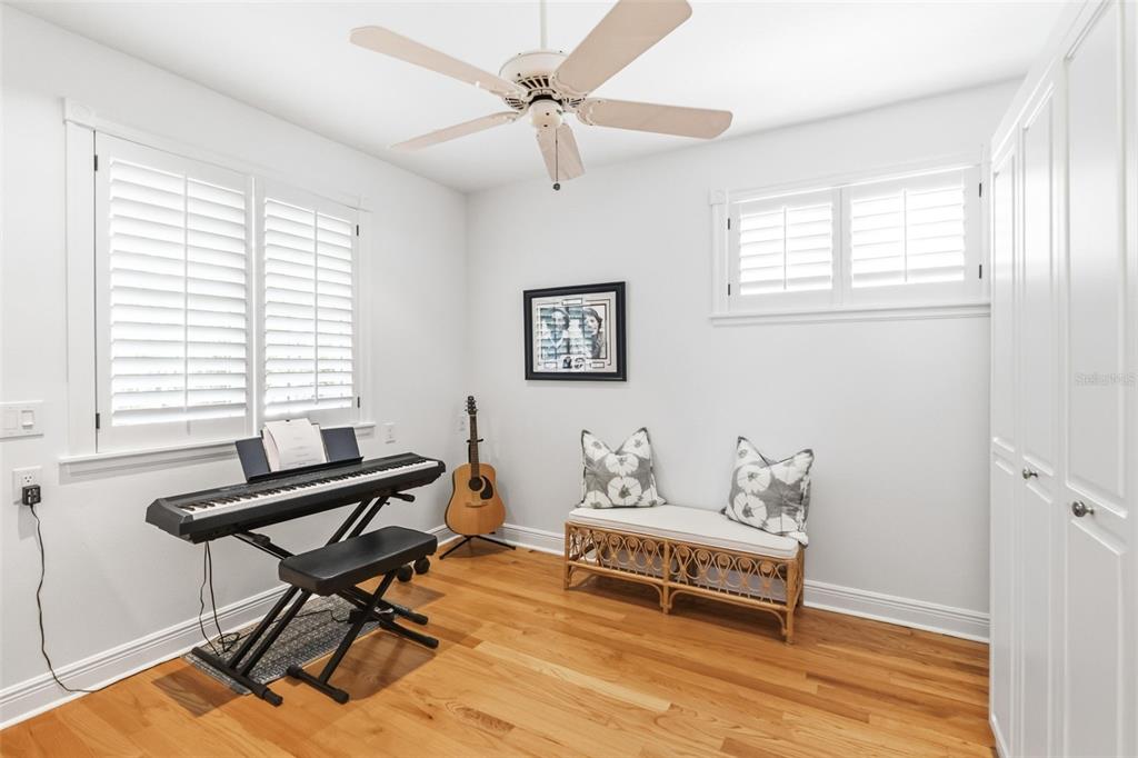 5382 Sandhamn Place Longboat Key, FL 34228 - Photo 30 of 55 a living room with furniture and a window