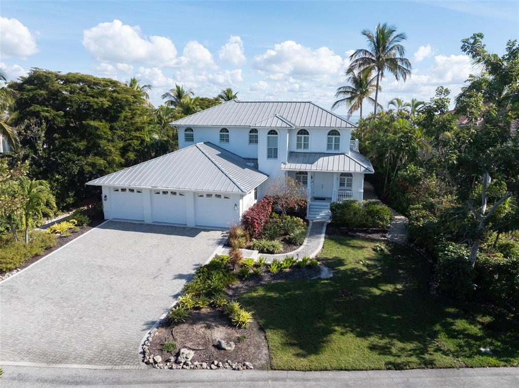 5382 Sandhamn Place Longboat Key, FL 34228 - Photo 46 of 55 a aerial view of a house