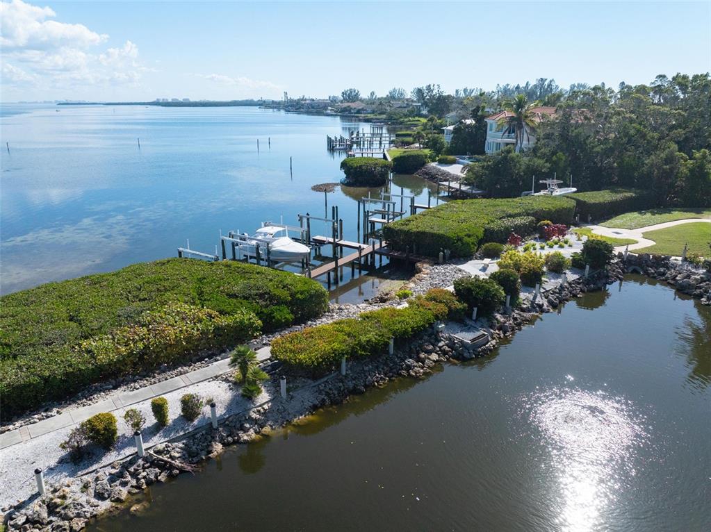 5382 Sandhamn Place Longboat Key, FL 34228 - Photo 50 of 55 a view of a lake with a city