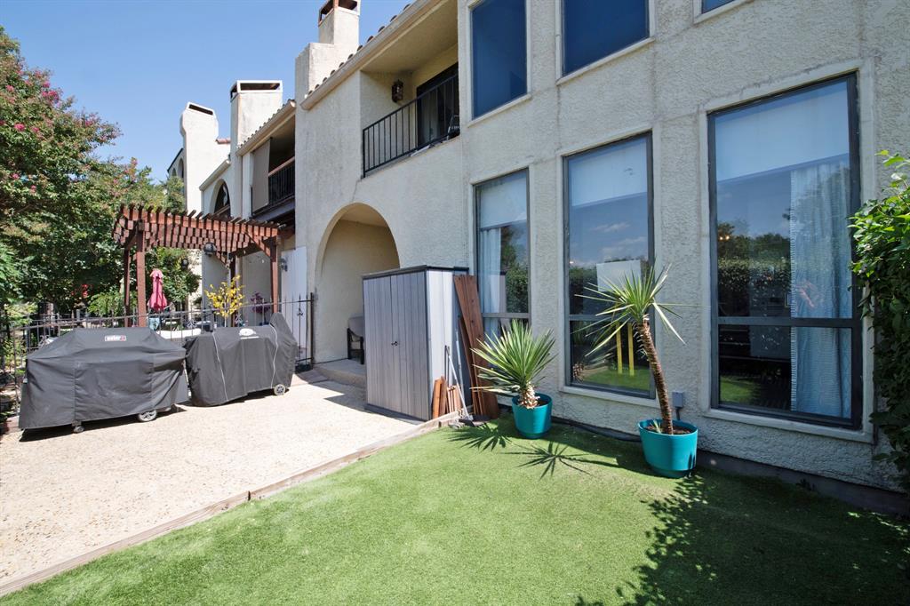 3915 Roma Court Rockwall, TX 75087 - Photo 37 of 40 Back of house with a patio area, a chimney, stucco siding, and a pergola
