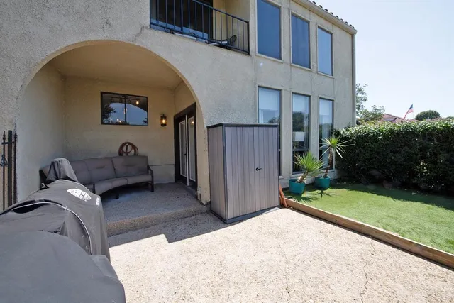 a view of backyard with garage