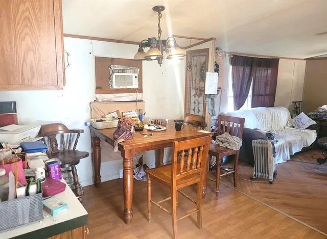 a kitchen with a sink cabinets and appliances