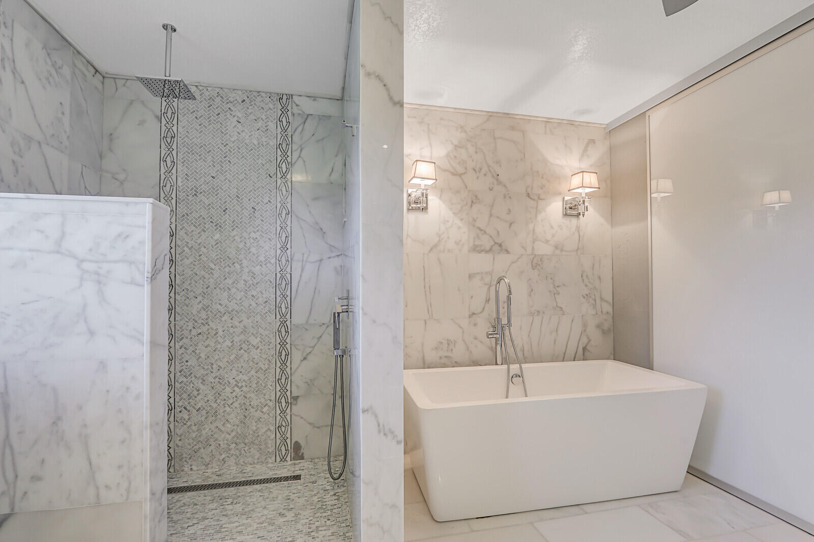 6136 Southeast Georgetown Place Hobe Sound, FL 33455 - Photo 32 of 46 a bathroom with a bathtub and shower