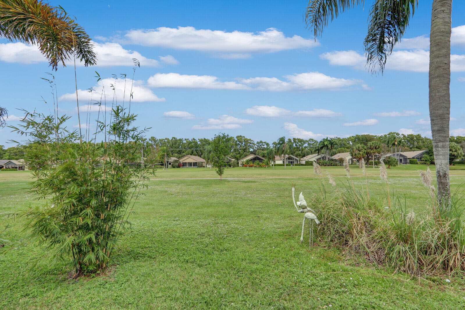 6136 Southeast Georgetown Place Hobe Sound, FL 33455 - Photo 37 of 46 a view of a lake with a city