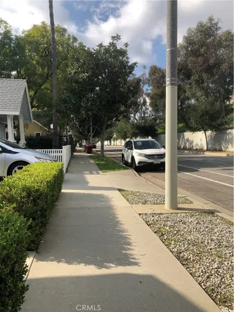 a view of a street with houses