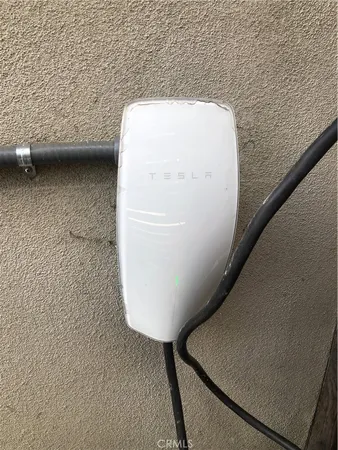 a balcony with furniture and wooden floor