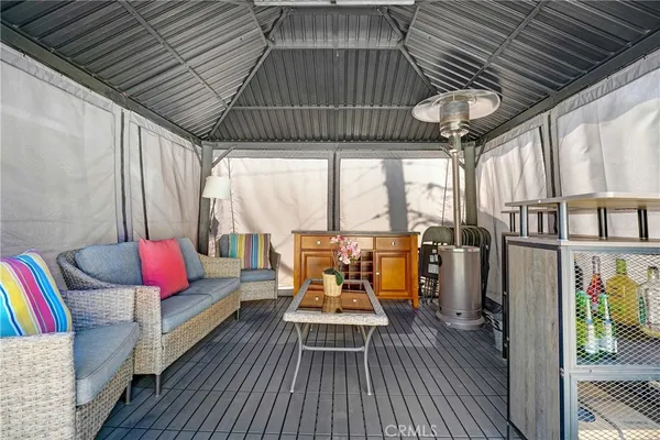 a view of a porch of a house