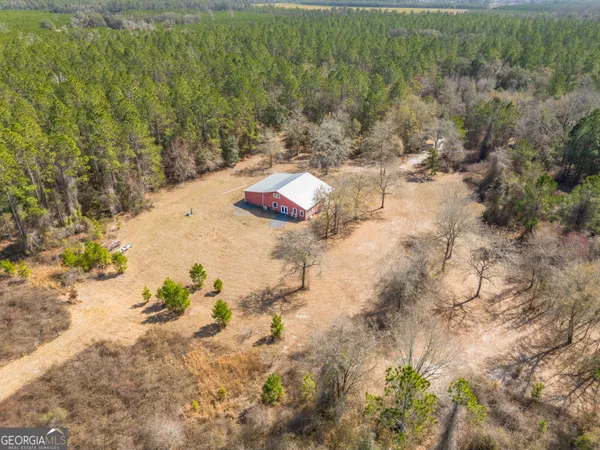 a view of backyard with green space
