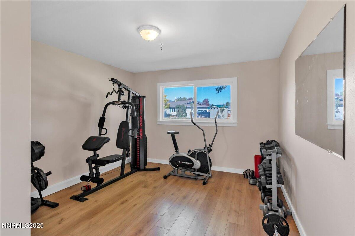 1231 Manhattan Way Gardnerville, NV 89460 - Photo 15 of 45 a view of a room with gym equipment