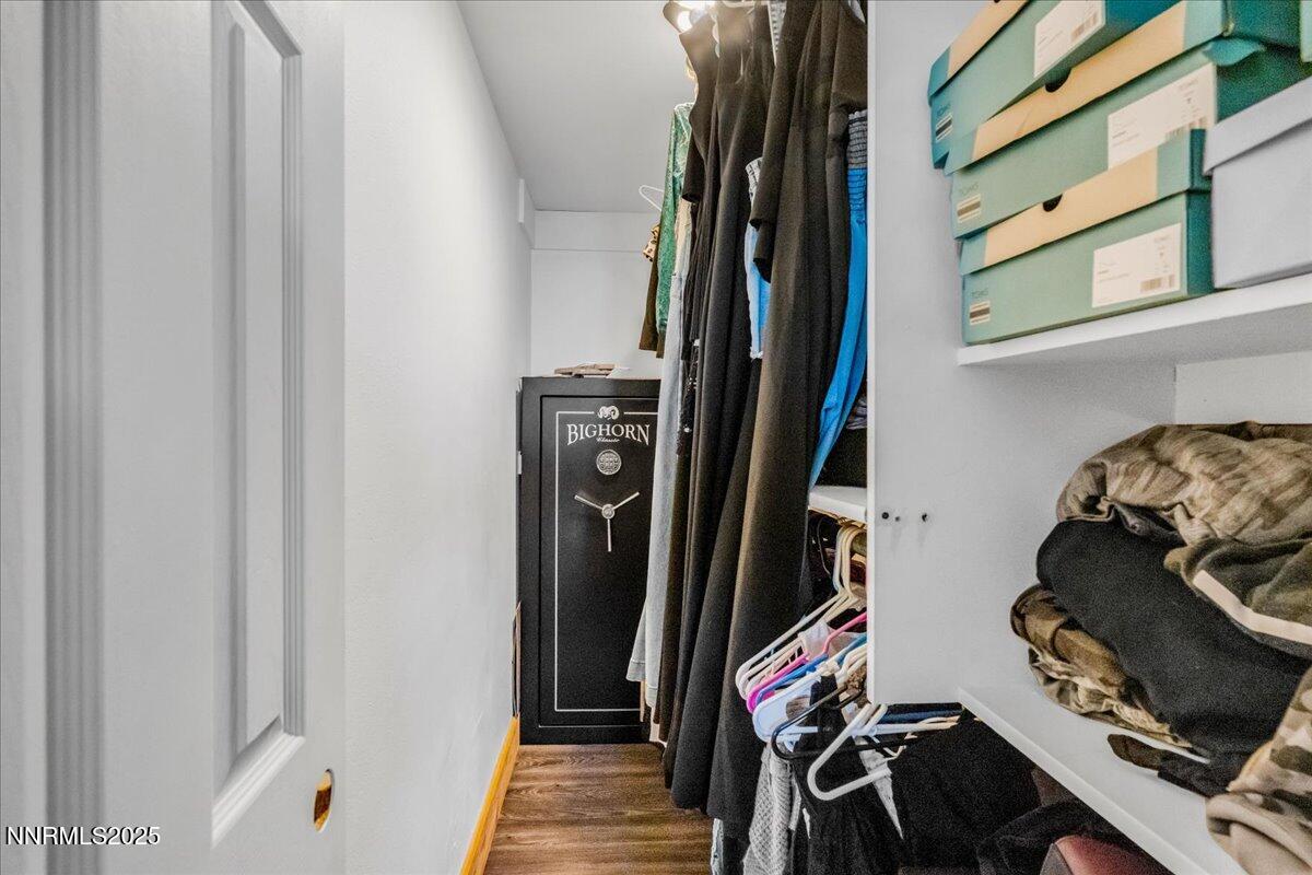 1231 Manhattan Way Gardnerville, NV 89460 - Photo 26 of 45 a view of walk in closet with clothes
