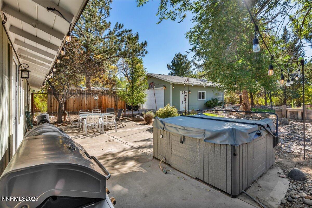 1231 Manhattan Way Gardnerville, NV 89460 - Photo 27 of 45 a view of outdoor sitting furniture and fire pit