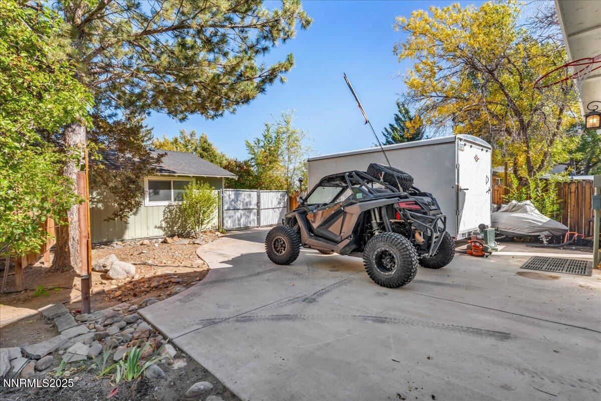 1231 Manhattan Way Gardnerville, NV 89460 - Photo 30 of 45 a view of a garage with parked cars