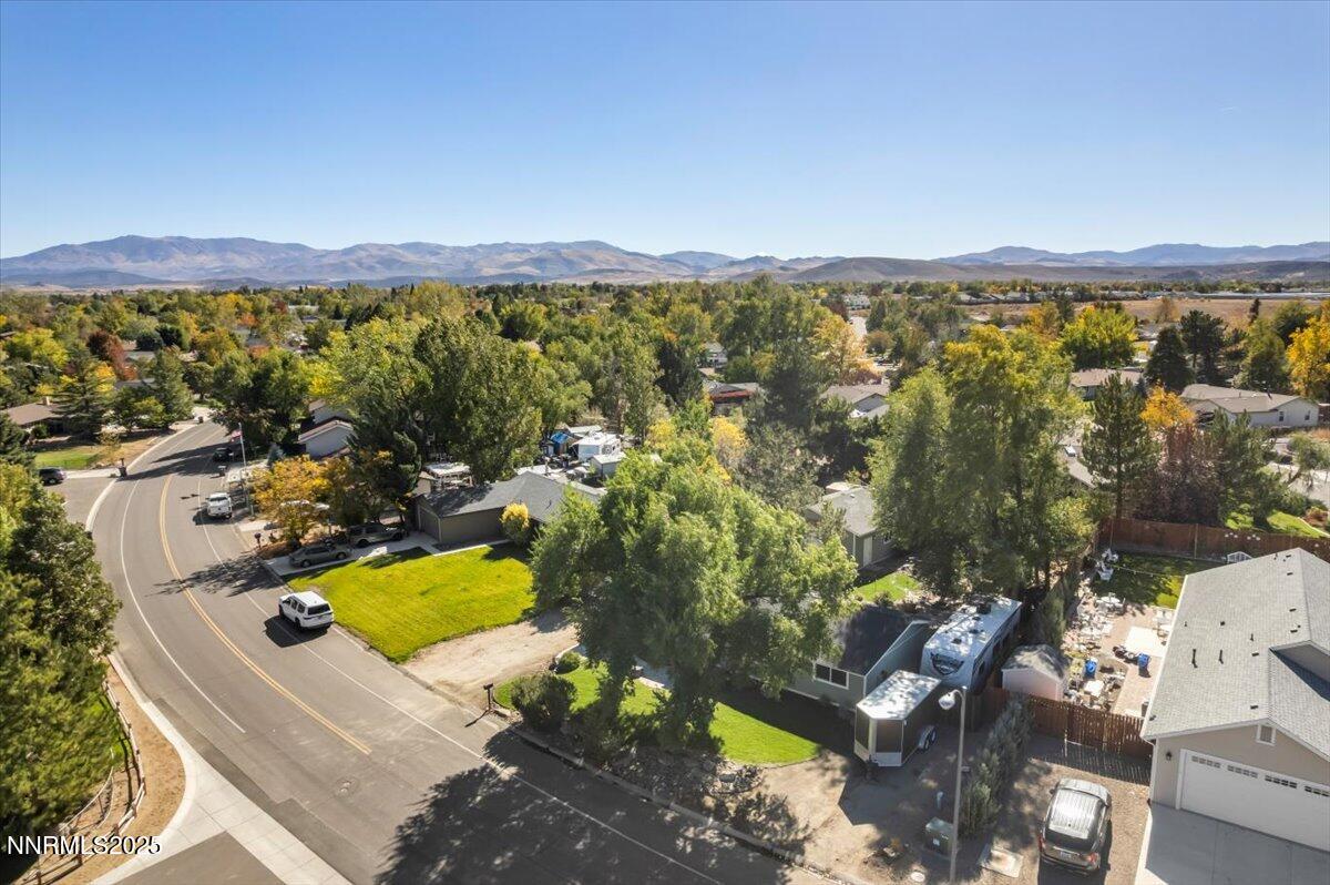 1231 Manhattan Way Gardnerville, NV 89460 - Photo 3 of 45 a view of a city with mountains in the background