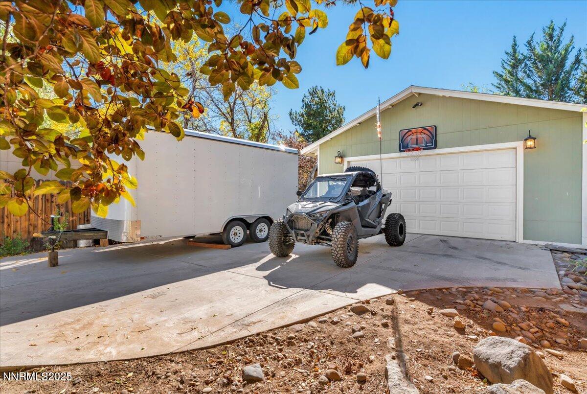 1231 Manhattan Way Gardnerville, NV 89460 - Photo 31 of 45 a view of a back yard of the house