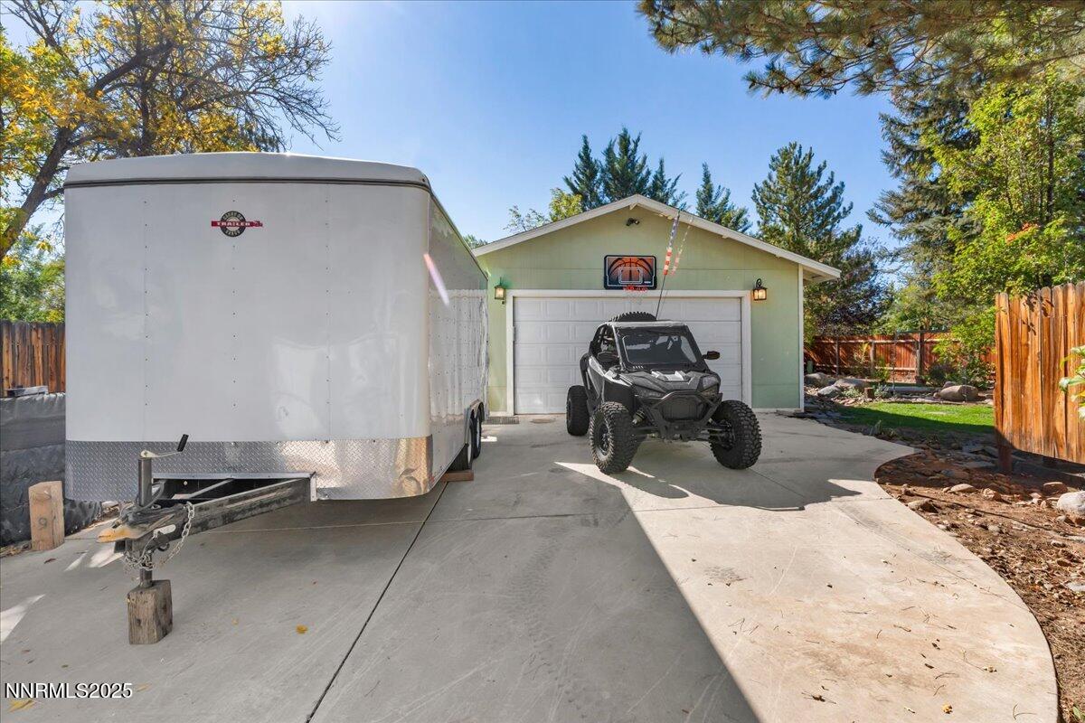 1231 Manhattan Way Gardnerville, NV 89460 - Photo 32 of 45 a view of a backyard