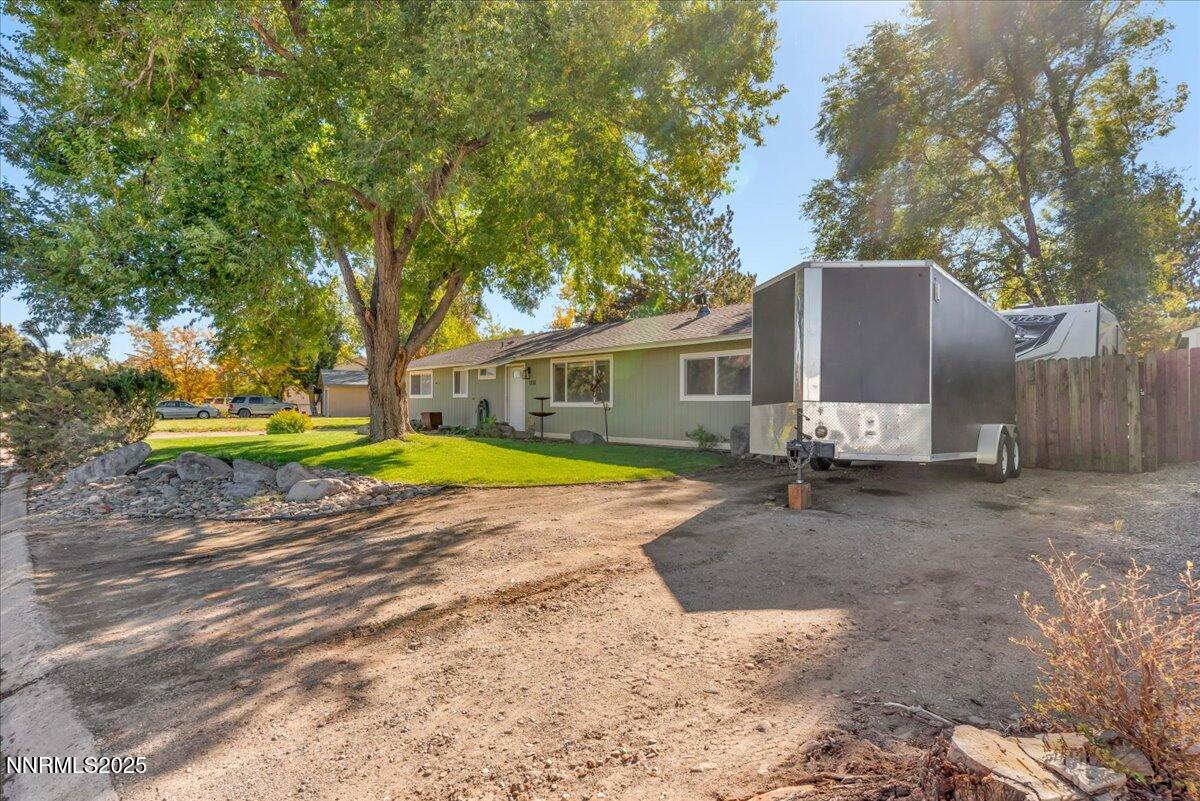 1231 Manhattan Way Gardnerville, NV 89460 - Photo 42 of 45 a view of a house with backyard and sitting area