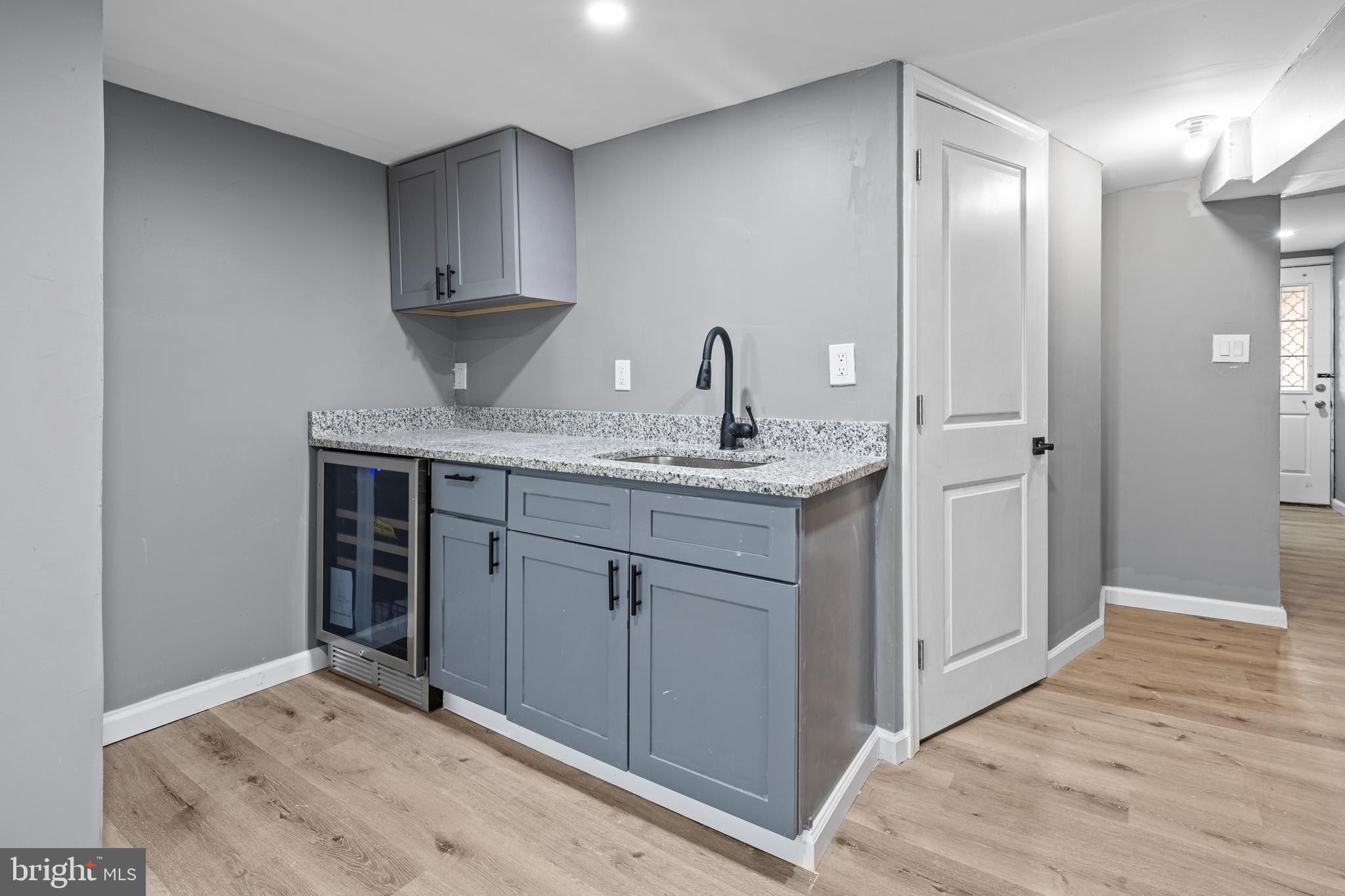 5325 Kershaw Street Philadelphia, PA 19131 - Photo 12 of 20 a kitchen with a sink and cabinets