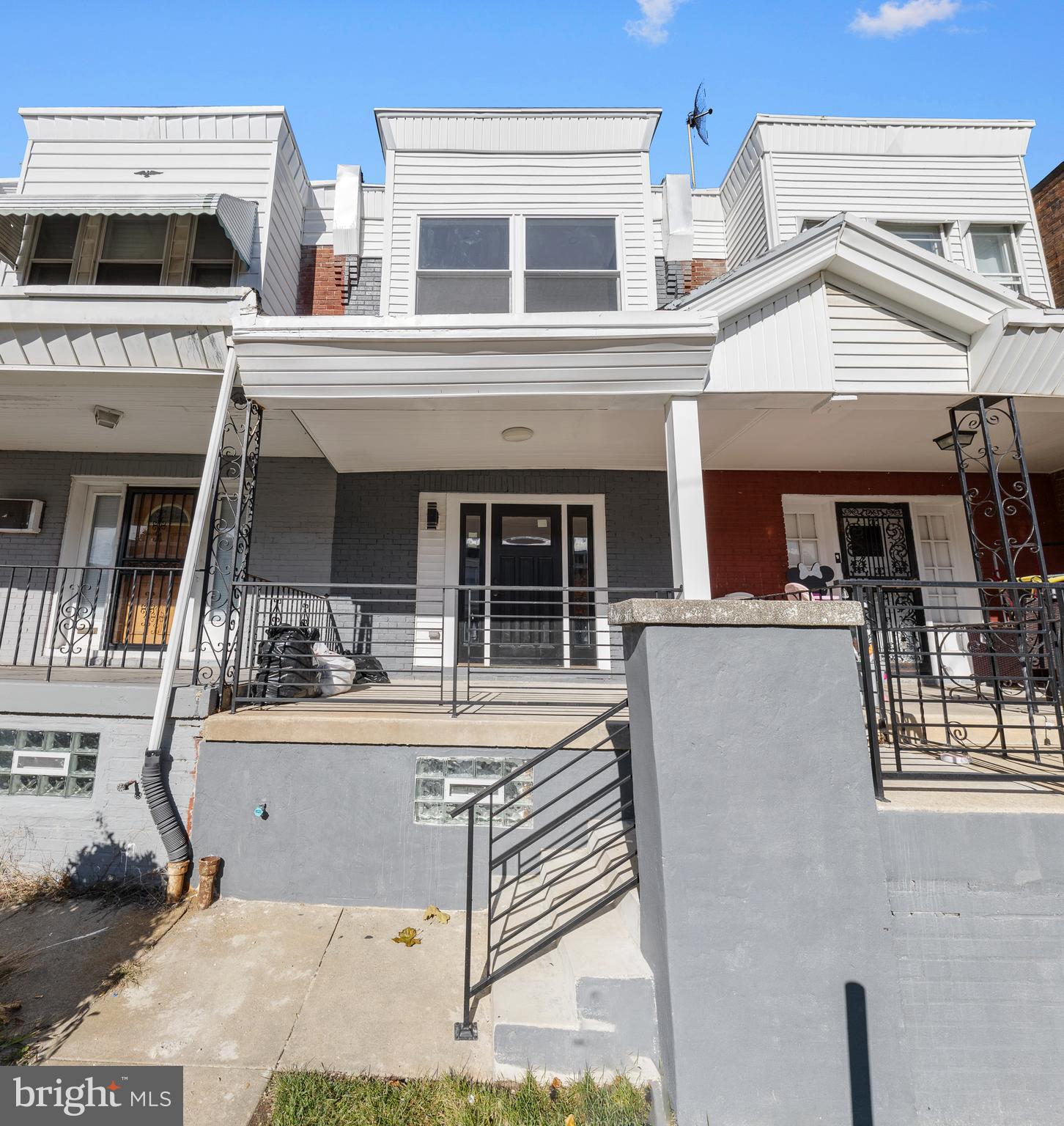 5325 Kershaw Street Philadelphia, PA 19131 - Photo 17 of 20 a view of a white building with large windows