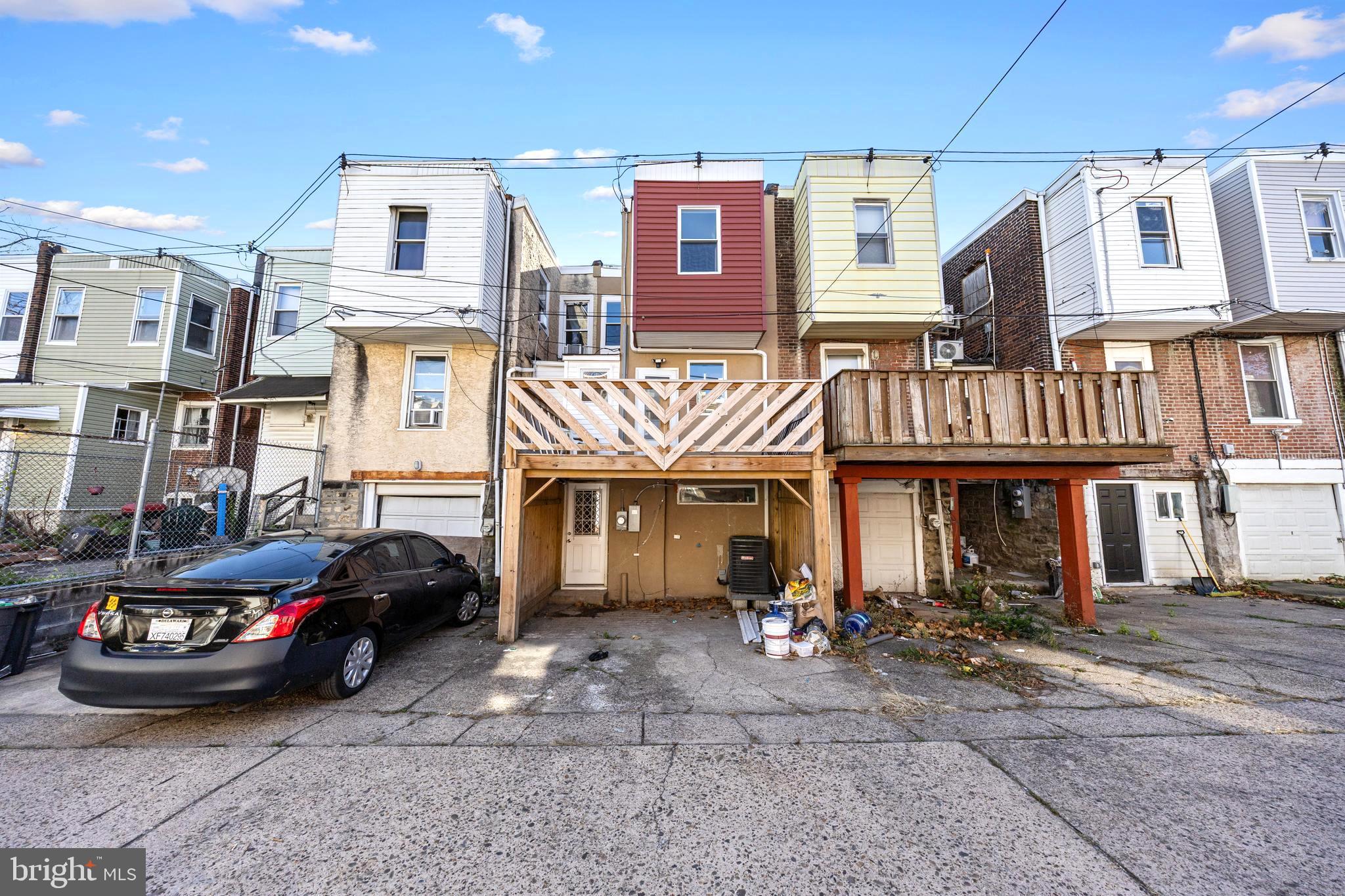 5325 Kershaw Street Philadelphia, PA 19131 - Photo 20 of 20 a front view of a house with parking space