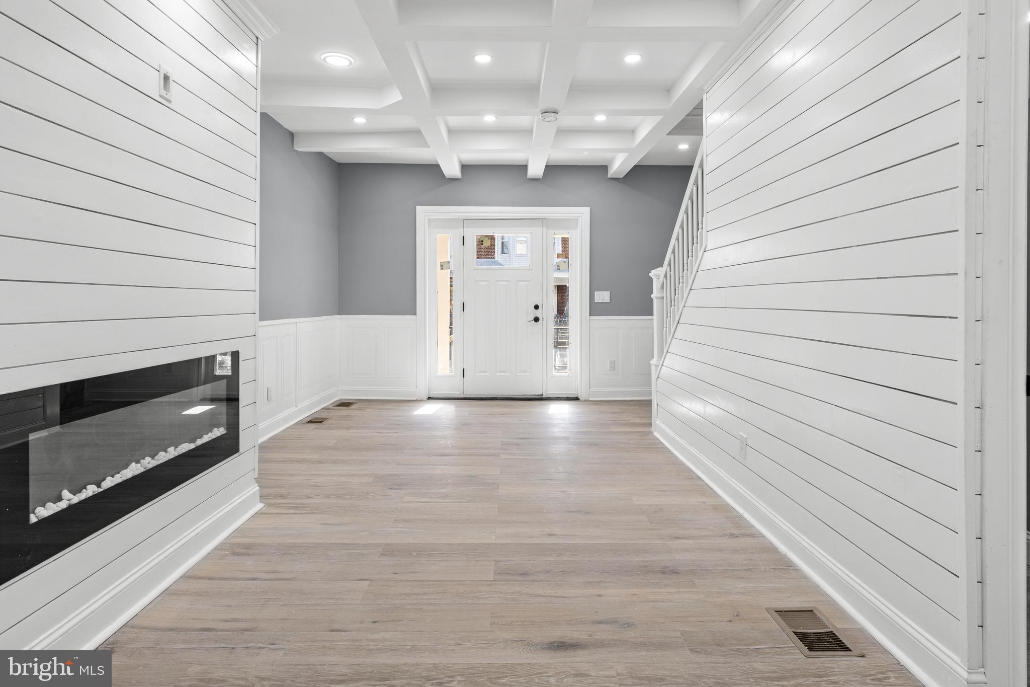5325 Kershaw Street Philadelphia, PA 19131 - Photo 4 of 20 a view of a hallway with wooden floors and kitchen view