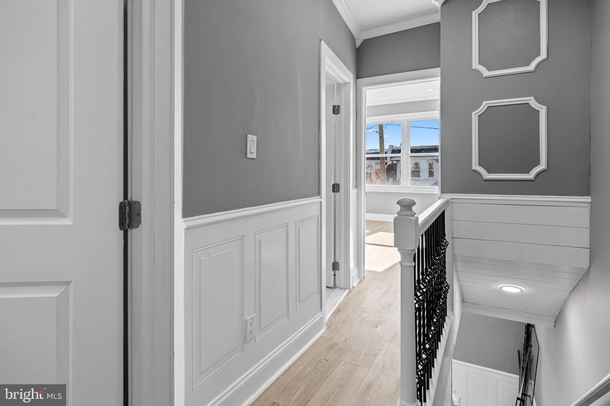 5325 Kershaw Street Philadelphia, PA 19131 - Photo 6 of 20 a view of a hallway with wooden floor and staircase