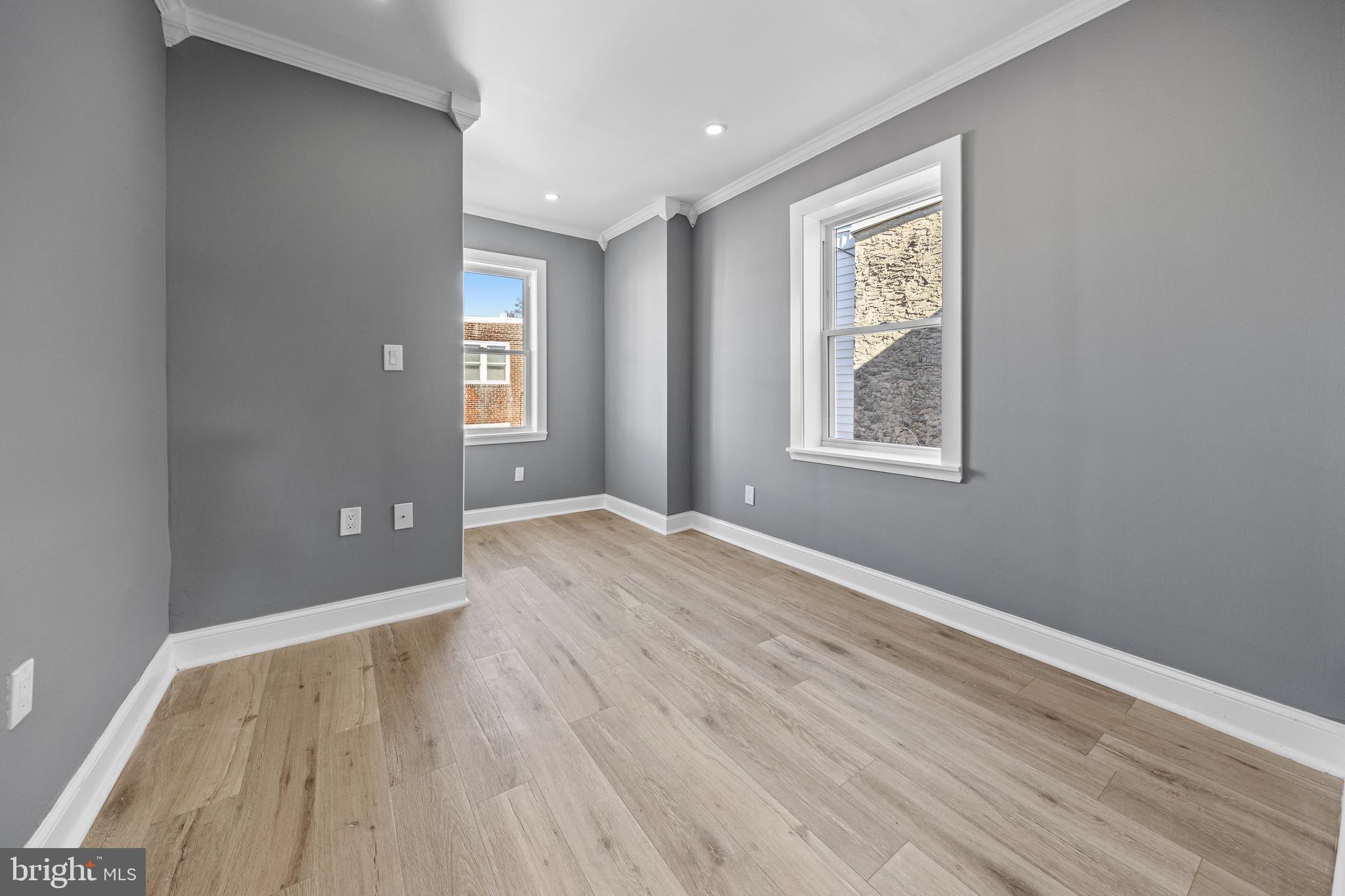 5325 Kershaw Street Philadelphia, PA 19131 - Photo 9 of 20 an empty room with wooden floor and windows