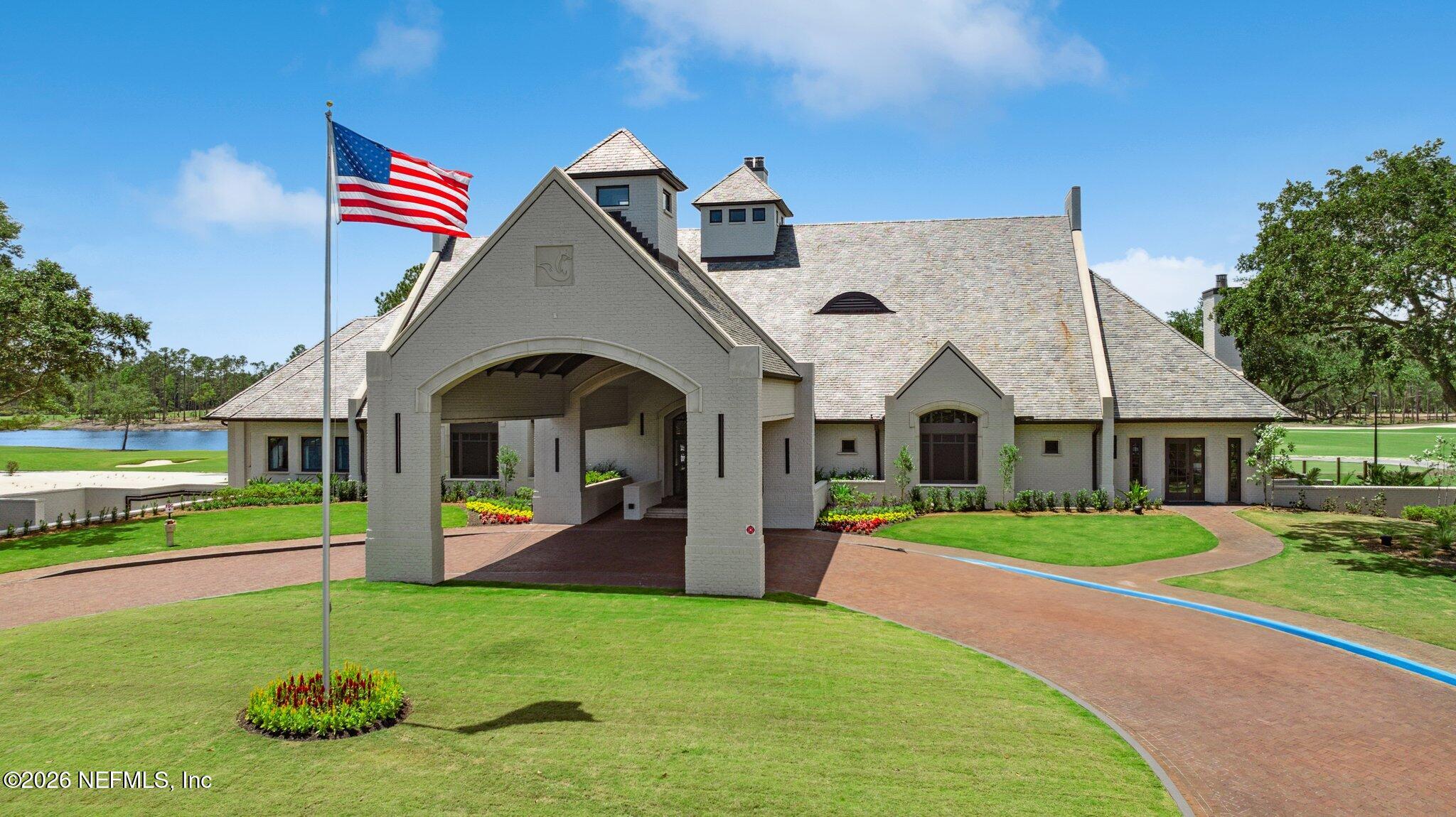 4745 Hunterston Lane Jacksonville, FL 32224 - Photo 3 of 6 a front view of a house with a yard and garage