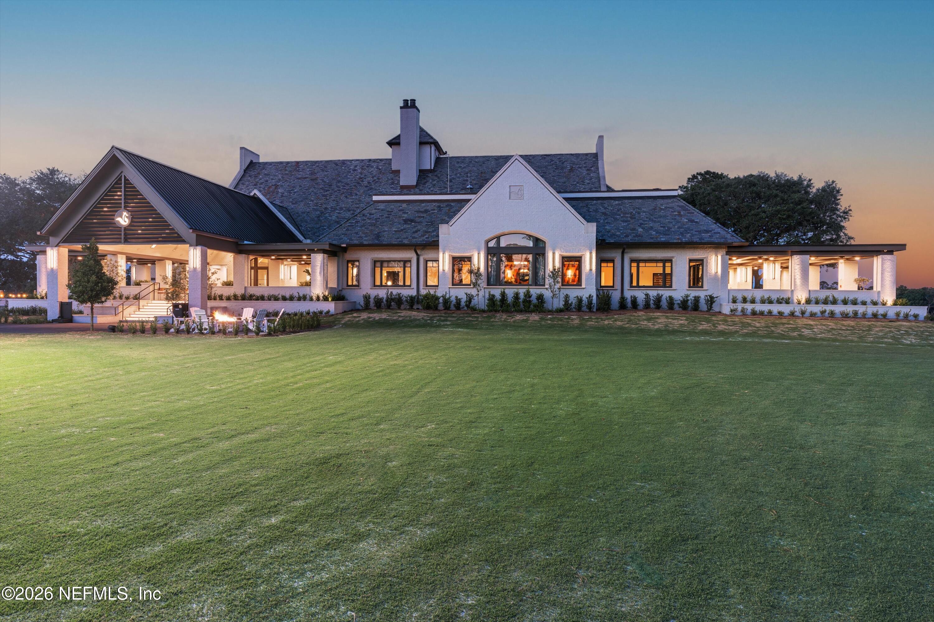 4745 Hunterston Lane Jacksonville, FL 32224 - Photo 5 of 6 a front view of a house with garden