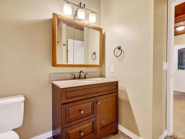 a front view of house with yard and outdoor seating