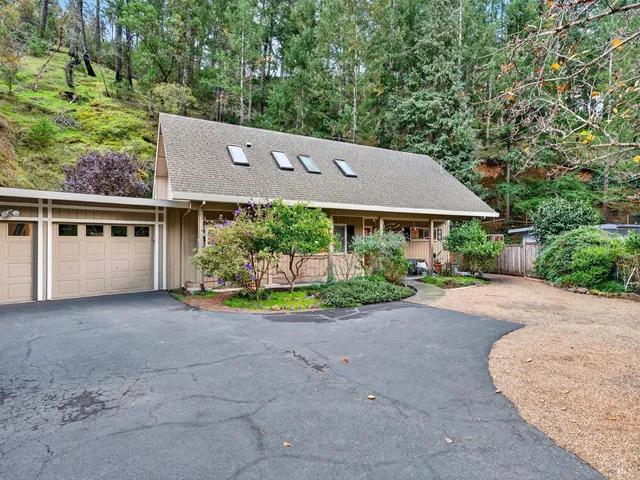 a bedroom with a bed and a table
