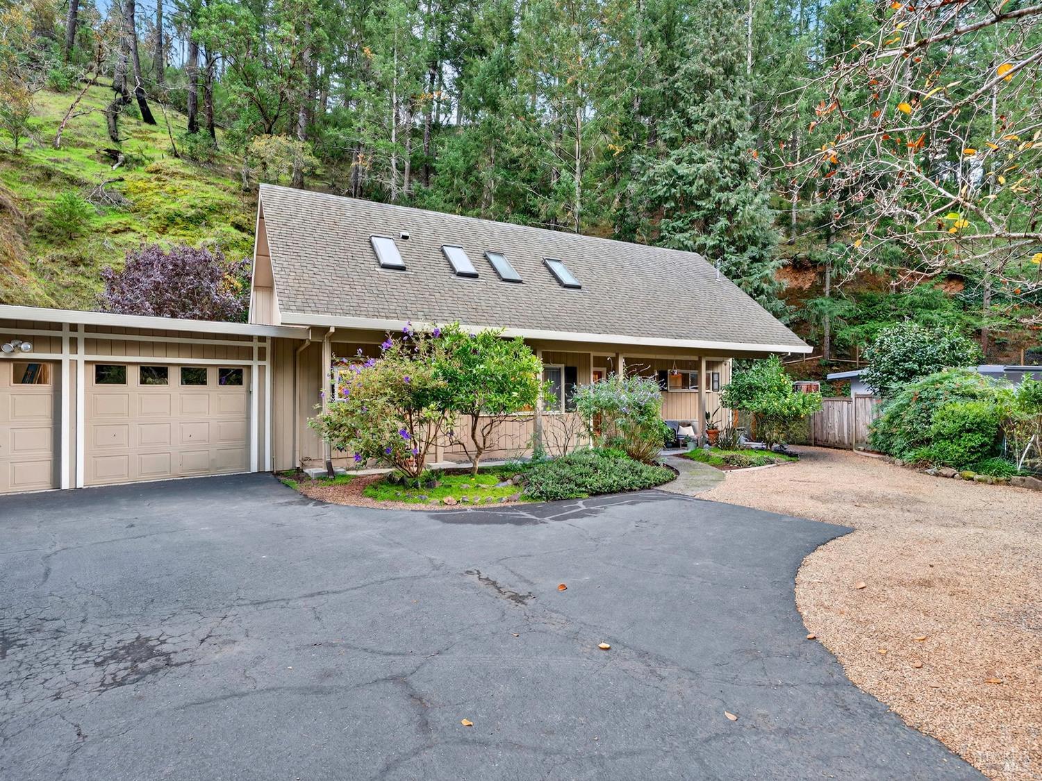 1290 Adobe Canyon Road Kenwood, CA 95452 - Photo 30 of 62 front view of a house with a yard