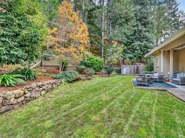 an aerial view of residential house and outdoor space